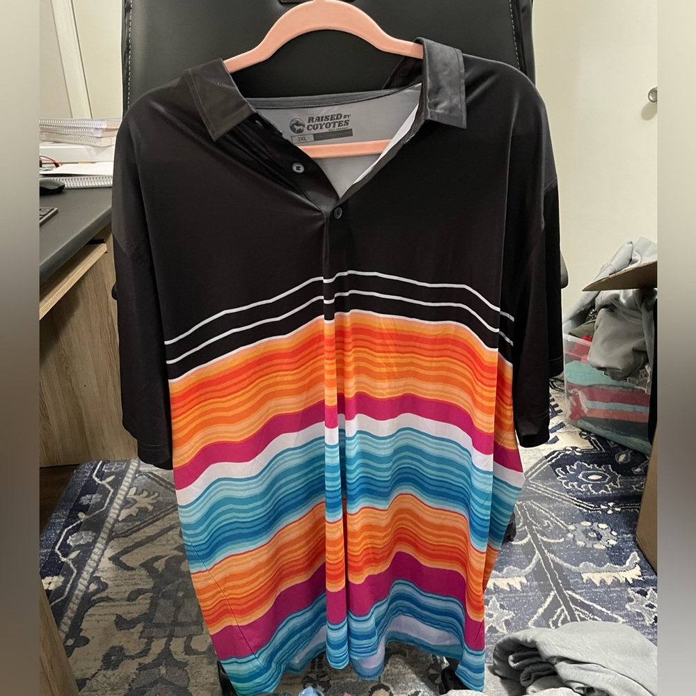 Raised by Coyotes Golf Polo